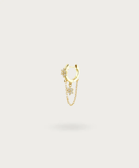 "Hermoso piercing de cadena bañado en oro"