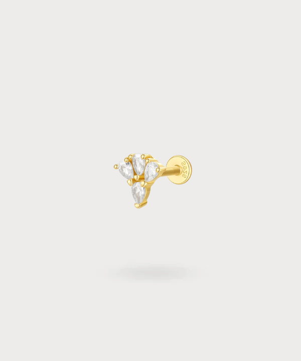 Piercing Flat Lisa con circonitas talladas en forma de gota, en oro y plata.