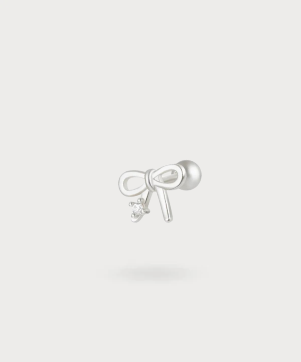 Añade un toque de encanto a tu estilo con el piercing Isabel