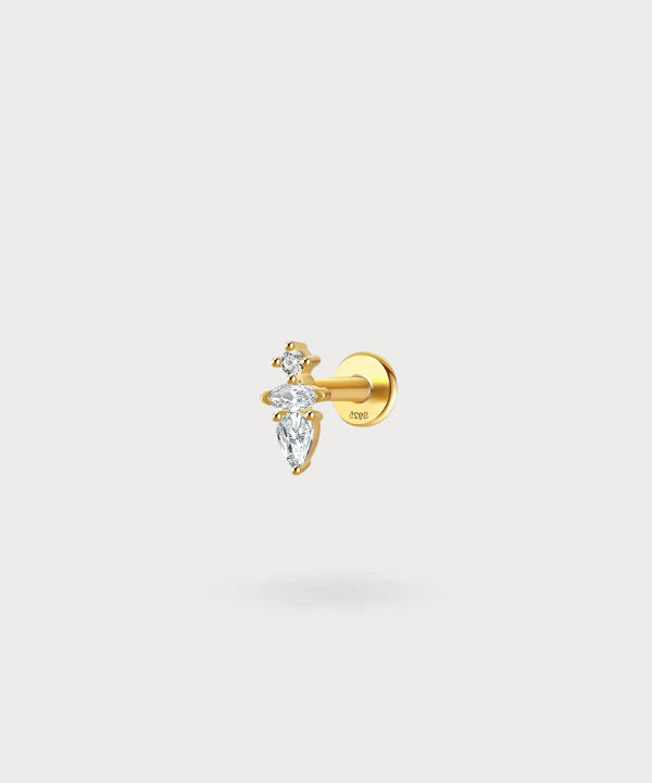 Piercing anti helix Ariadni, una cascada de circonitas doradas para una elegancia clásica.