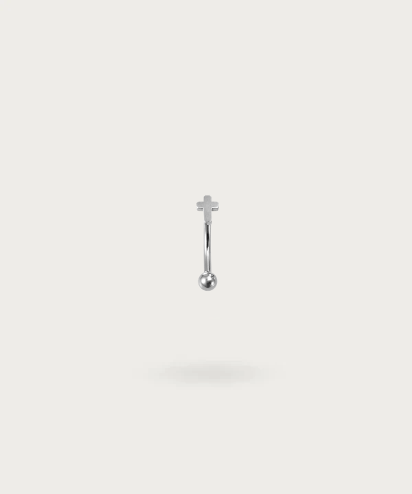 piercing curve rook en forma de cruz
