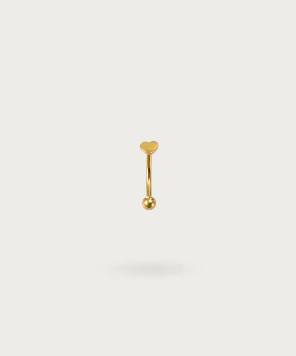 piercing rook banana con una corazon