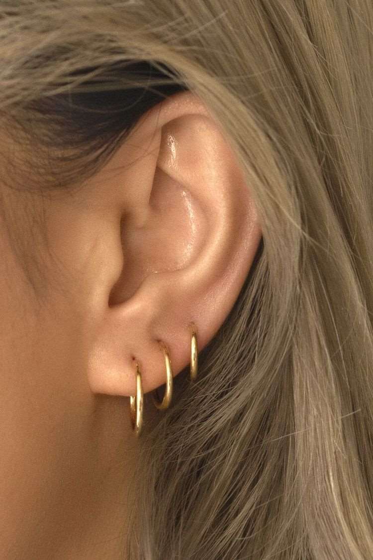 aro piercing oro titanio mujer