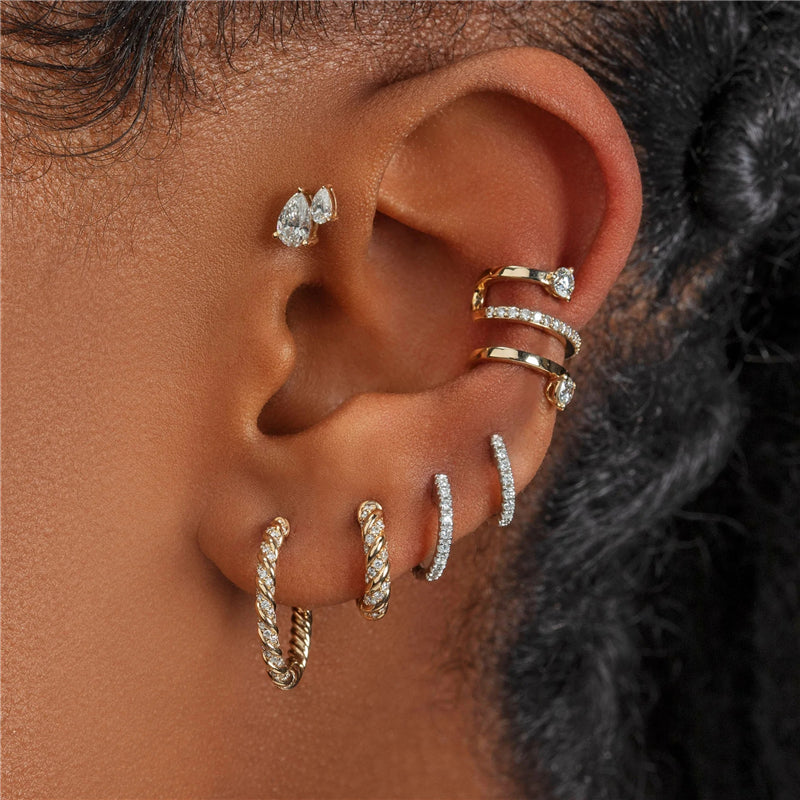 mujer con piercing aro de pierdras