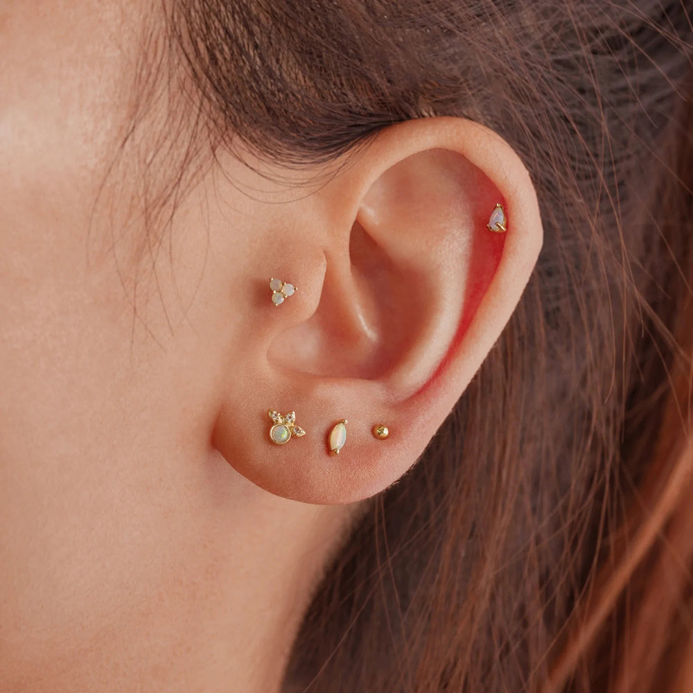 piercing oreja opalo en oro con circonitas mujer