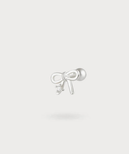 Sublime elegancia con el piercing flat Isabel, disponible en oro o plata