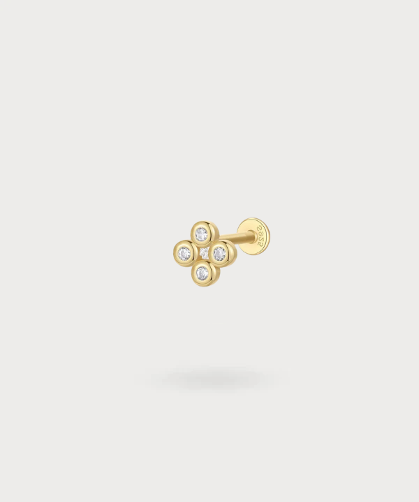 Piercing tragus Elorri con cuatro circonitas, elegancia minimalista en oro