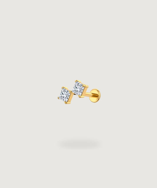 Piercing Lóbulo Nayra, un brillo elegante con un toque de resplandor